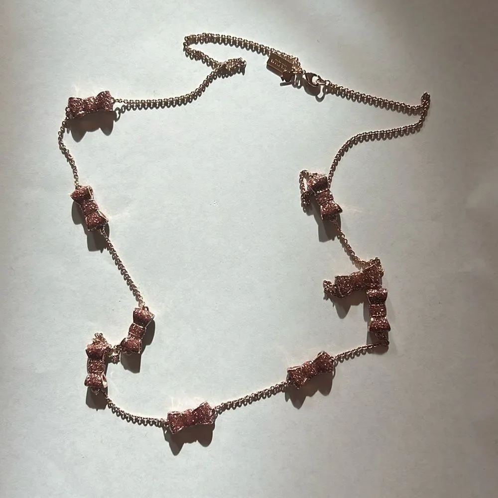 Kate spade take a bow sparkly pink statement long necklace